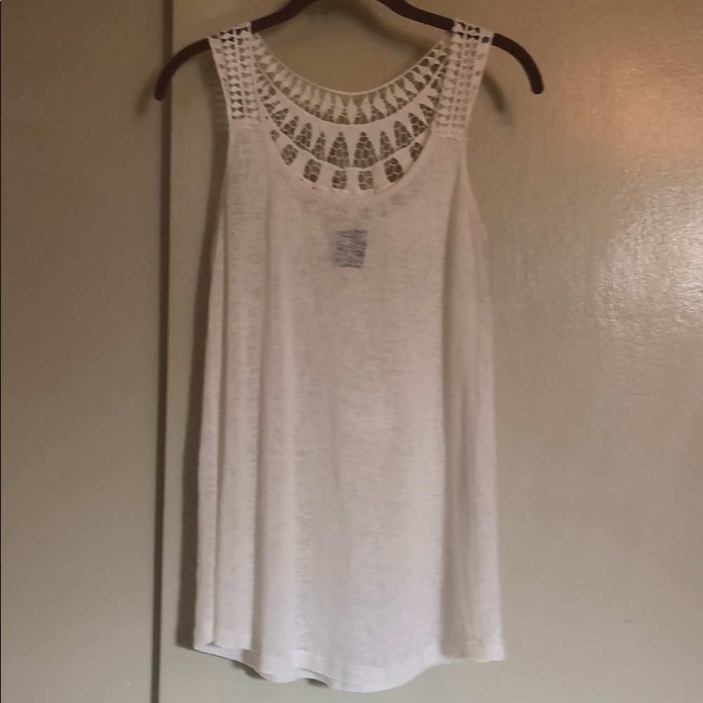 Tunic tank with crochet detail.